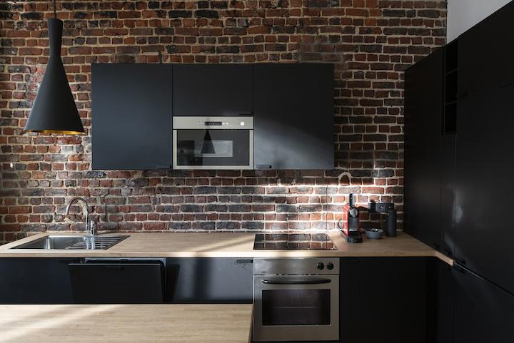 Herwaardering van bakstenen in open keuken